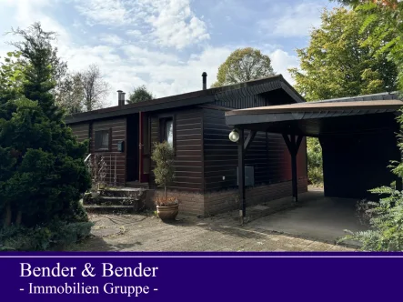 Hausansicht - Haus kaufen in Mittelhof - Kleines, gemütliches Ferienhaus mit Carport und Terrasse - Erstwohnsitz möglich!