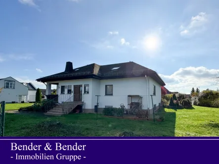 Hausansicht - Haus kaufen in Beselich - Charmanter Bungalow mit großem Garten in ruhiger Lage zwischen Weilburg und Limburg!