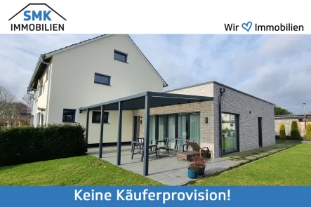 Titelbild - Haus kaufen in Verl - Modernes Generationenhaus in Verl-Sürenheide!