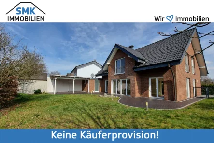 Titelbild - Haus kaufen in Verl / Sürenheide - Großzügiges Traumhaus mit Keller, Garage und Garten in Sürenheide!