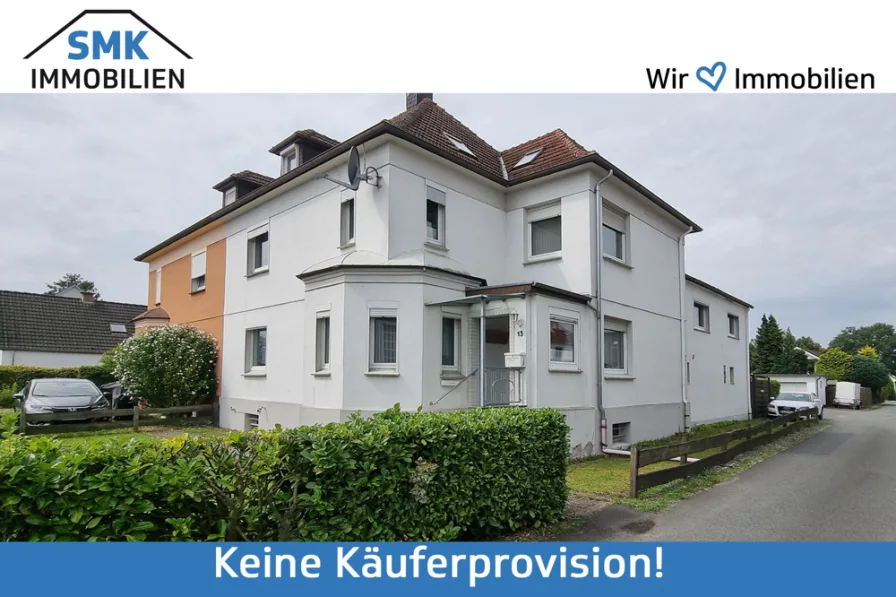 Titelbild - Haus kaufen in Gütersloh - Charmante Doppelhaushälftemit optionalem Baugrundstück!