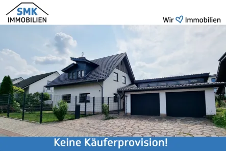 Titelbild - Haus kaufen in Augustdorf - Junges Einfamilienhaus mit Einliegerwohnung am Fuße des Teutoburger Waldes!