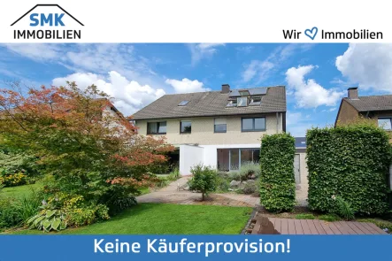 Tielbild - Haus kaufen in Schloß Holte-Stukenbrock - Machen Sie es sich gemütlich: Doppelhaushälfte mit Keller und Garage in Schloß Holte!