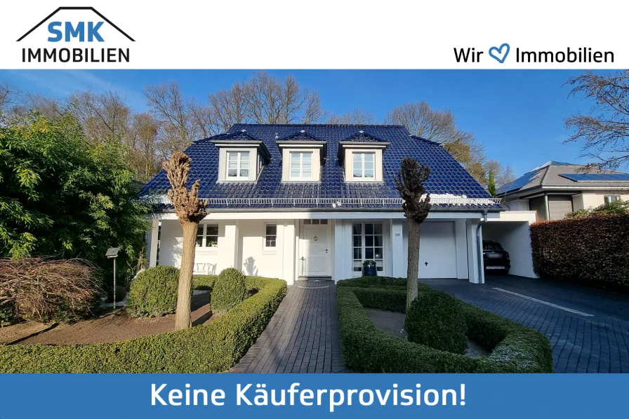 Titelbild - Haus kaufen in Rheda-Wiedenbrück - Elegantes Einfamilienhaus mit exklusiver Ausstattung in Rheda-Wiedenbrück!