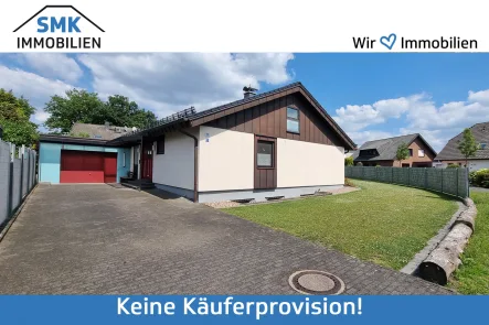 Titelbild - Haus kaufen in Verl - Modernisiert & energieeffizient: Gepflegtes Einfamilienhaus in ruhiger Sackgassenlage!