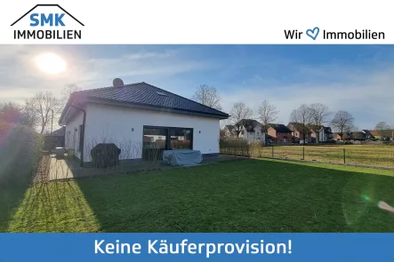 Tielbild - Haus kaufen in Verl - Energieeffizient und zeitlos: Bungalow mit modernem Flair mitten in Verl!