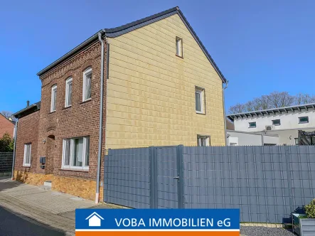 Bild1 - Haus kaufen in Hückelhoven - Hinter schlichter Fassade top modernisiert!