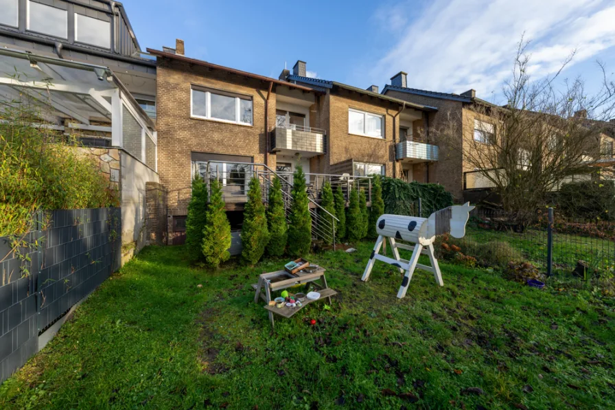 Rückansicht - Haus kaufen in Lünen - Familienfreundliches Reihenmittelhaus mit großem Garten in beliebter Wohnlage von Lünen-Horstmar