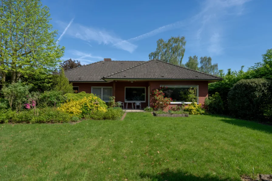 Rückansicht  - Haus kaufen in Lünen / Nordlünen - Ein Bungalow für die ganze Familie in bevorzugter Wohnlage von Altlünen