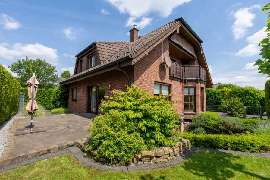 Rückansicht  - Haus kaufen in Nordkirchen / Südkirchen - 2-Familienhaus & extra Souterrain-Studio in begehrter Lage von Südkirchen