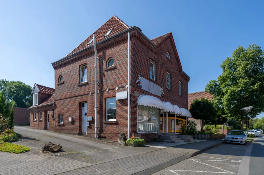 Frontansicht - Haus kaufen in Nordkirchen - Wohn- & Geschäftshaus mit einer Gesamtwohn- und Nutzfläche von ca. 256m²