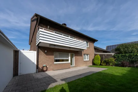 Rückansicht  - Haus kaufen in Selm-Cappenberg - 2-Familienhaus mit Garten in begehrter Wohnlage von Cappenberg