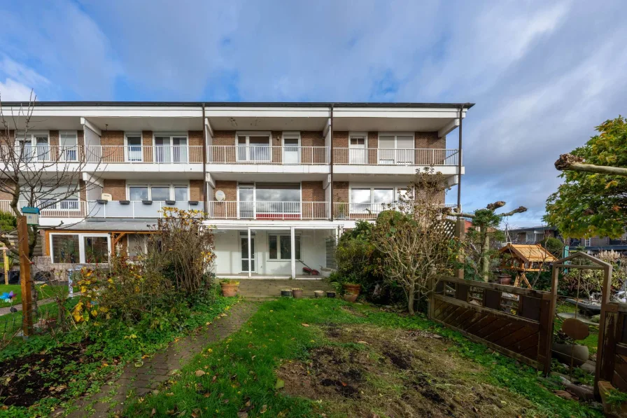 Rückansicht - Haus kaufen in Lünen - Familienfreundliches Reihenmittelhaus in beliebter Wohnlage von Lünen-Alstedde