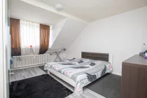 Schlafzimmer Foto 1