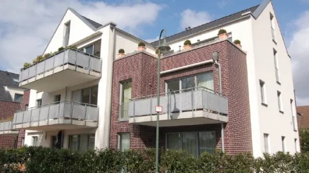 Rückansicht - Wohnung kaufen in Düsseldorf / Kaiserswerth - 3-Zimmer-Gartenwohnung in zentraler Lage mit sehr guter Ausstattung
