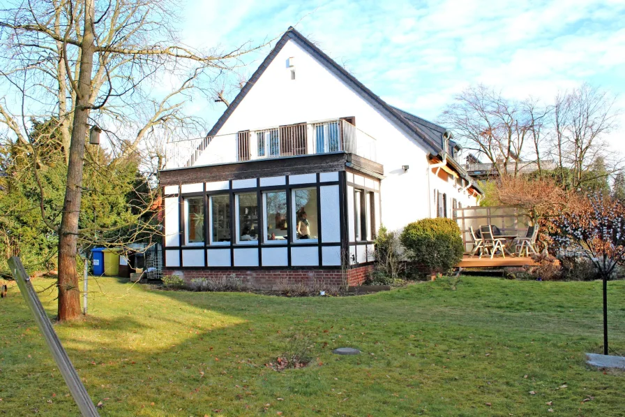 Ansicht - Haus mieten in Meerbusch - Charmantes Einfamilienhaus mit großem Garten