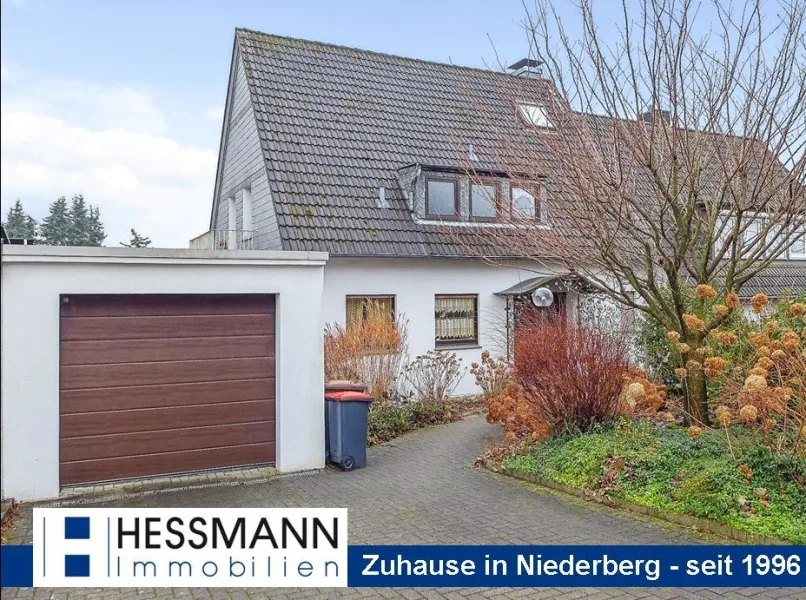 Titelbild - Haus kaufen in Velbert - Geräumige Doppelhaushälfte auf großem Grundstück in bevorzugter Wohnlage von Velbert