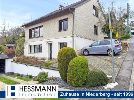 Rückansicht - Haus kaufen in Velbert - Freistehendes 1-Fam.-Haus mit Einliegerwohnung in ruhiger Lage von Langenberg