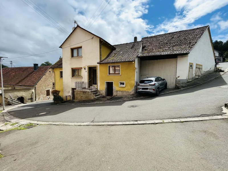 Front - Haus kaufen in Jeckenbach - Einfamilienhaus mit Scheune