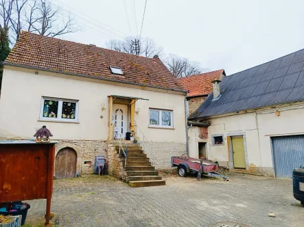 Ansicht - Haus kaufen in Finkenbach-Gersweiler - Einfamilienhaus mit Garten, Nebengebäude und Garage