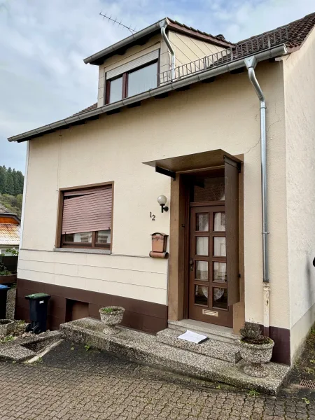 Ansicht - Haus kaufen in Lauterecken - Kleines Stadthaus mit Terrasse und Garage