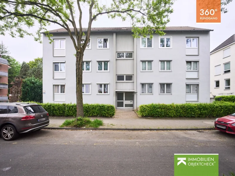 Hausansicht - Wohnung kaufen in Düsseldorf - 3-Zimmer-Wohnung mit Balkon - schöner Blick in den Garten!
