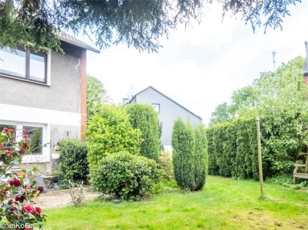 9541-Blick in den Garten - Haus kaufen in Marl - Polsum: Gemütliche Doppelhaushälfte auf ca.107m² Wfl. + 405m² Grund. in Bestlage!