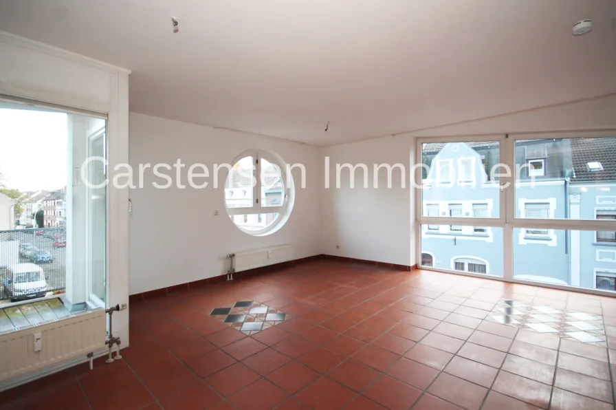 Wohnzimmer Bild 1  - Wohnung kaufen in Mönchengladbach - ETW MIT BALKON UND TIEFGARAGENPLATZ - WINDBERG ZENTRAL