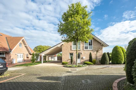 Frontansicht - Haus kaufen in Drensteinfurt - Energieeffizient-Komfortabel möbliert-Zukunftssicher! Schöner Wohnen im gehobenen Landhausstil!