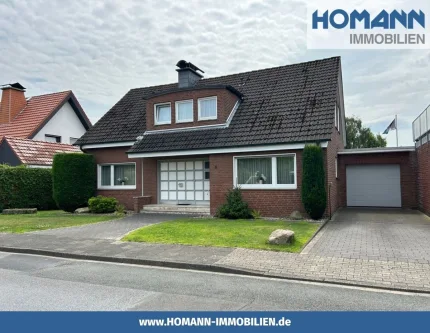 Hausansicht von vorne - Haus kaufen in Everswinkel - Schönes EFH mit freier Baufläche im Herzen von Everswinkel