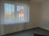 Ein Zimmer im I. OG