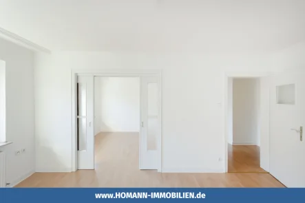 Wohnzimmer - Wohnung kaufen in Münster - Perfekt geschnittene 3-Zimmer-Wohnung mit Balkon in 1-A Lage!