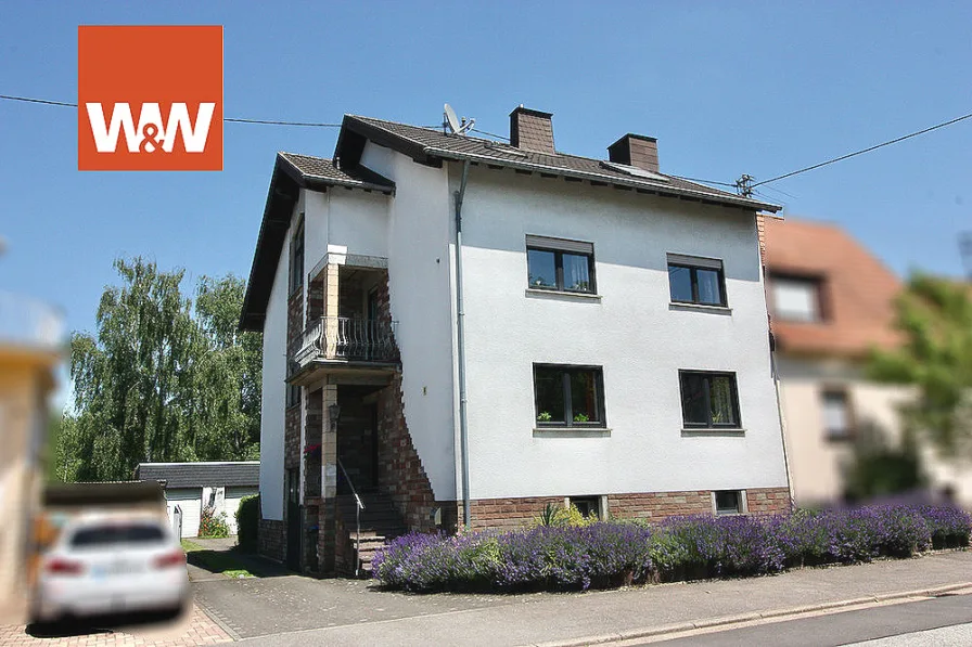 Ansicht - Haus kaufen in Überherrn - PROVISIONSFREI!Großes Mehrgenerationenhaus mit 8 Zimmern auf 543 m² Grundstück.