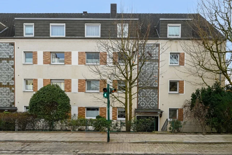 Hausansicht - Wohnung kaufen in Essen - Freigezogene Eigentumswohnung, ca. 82 m², mit Balkon und Garage in Essen - Freisenbruch