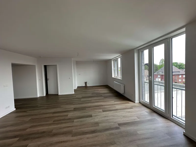 Wohnzimmer - Wohnung mieten in Oberhausen - Fußgängerzone. Großzügig. Modern. Lichtdurchflutet.
