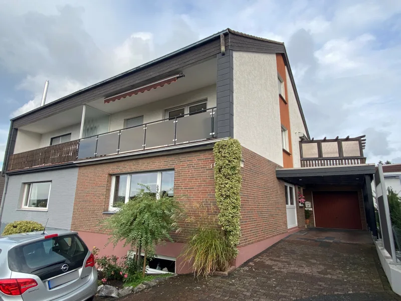 Straßenansicht - Haus kaufen in Arnsberg - Gepflegtes Wohnhaus mit 2 Wohnungen („Mehrgenerationenhaus“) in ruhiger Lage von Arnsberg-Herdringen