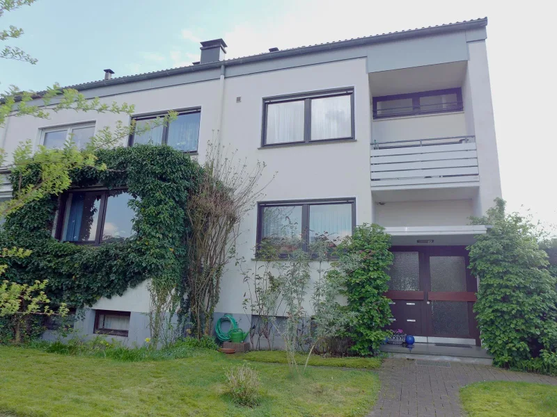 Hauseingang - Haus kaufen in Bielefeld - Mehrfamilienhaus Nähe Gellershagener Grünzug