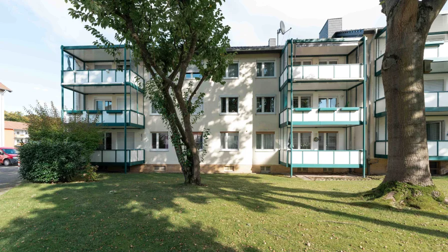 Objektansicht Rückseite - Wohnung kaufen in Bielefeld - Sehr gepflegte 3 ZKB-ETW mit Balkon in Stieghorst-Mitte!