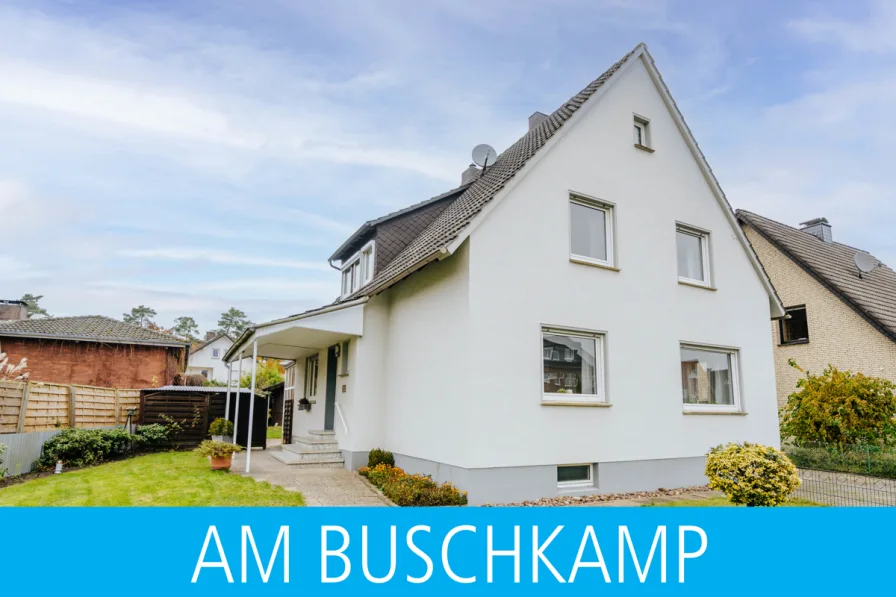 Ansicht - Haus kaufen in Schloß Holte - Familienfreundlich in toller Wohnlage!Ein-/ Zweifamilienhaus mit Garage