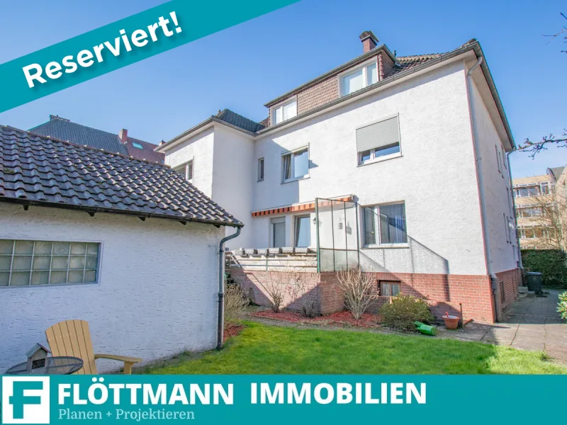 Reserviert - Haus kaufen in Bielefeld / Mitte - Charmantes Dreifamilienhaus mit Terrasse, Doppelgarage und Mietergemeinschaft in Bielefeld-Mitte!