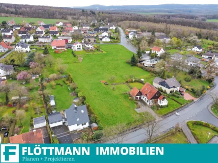 Luftbild - Grundstück kaufen in Detmold - Traumhaus-Grundstück in familienfreundlicher Lage von Detmold-Diestelbruch!