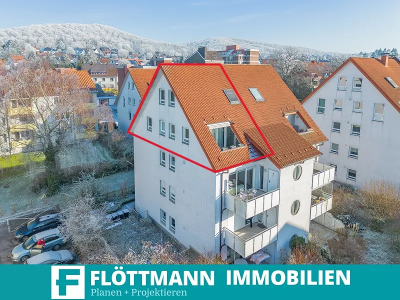 Luftansicht - Wohnung kaufen in Bielefeld / Brackwede - Maisonette-Wohnung in zentraler Lage von Brackwede – Komfortables Wohnen mit Balkon & Tiefgarage!