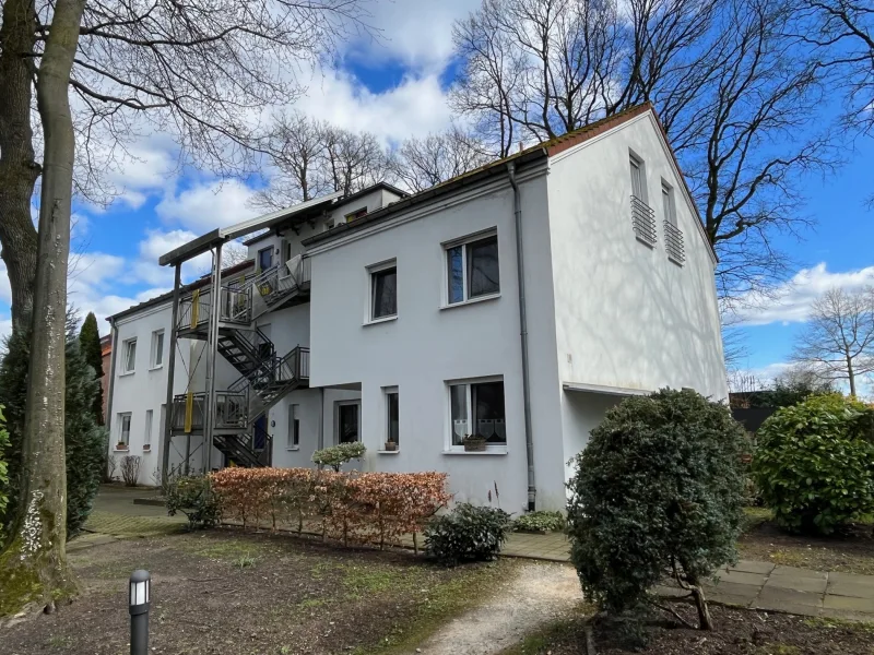 Gebäudeansicht - Wohnung kaufen in Gütersloh - Traumwohnung mit Doppelhaus-Charakter