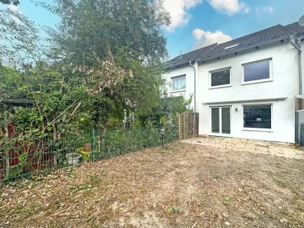 Titelbild - Haus kaufen in Bochum - Junges Reihenmittelhaus in gefragter Lagevon Riemke