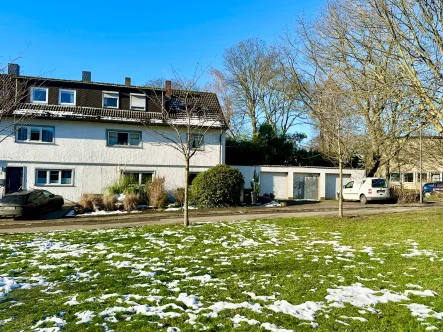 Titelbild - Haus kaufen in Bochum - Reihenendhaus mit Gartenidyllin Grumme