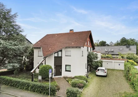 Hausansicht - Haus kaufen in Bonn - Zweifamilienhaus mit stillem Gewerbe, großer Wohnung und schönem Garten