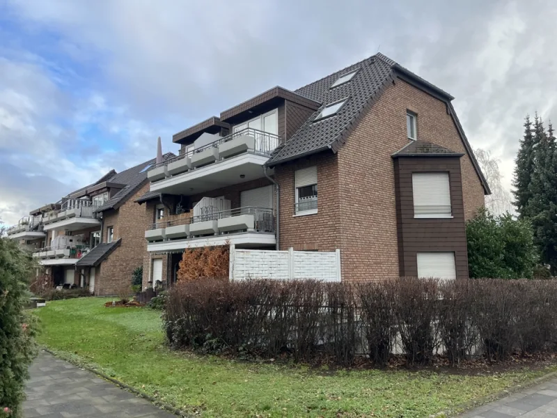 Gartenansicht - Wohnung kaufen in Königswinter / Oberdollendorf - Helle, top-geschnittene 2-Zimmer-Wohnung (vermietet) m. Sonnenbalkon/zentrale Lage v. Oberdollendorf