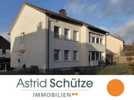  - Haus kaufen in Borgholzhausen - Borgholzhausen: gepflegtes Ein-Zweifamilienhaus mit vielen Extras