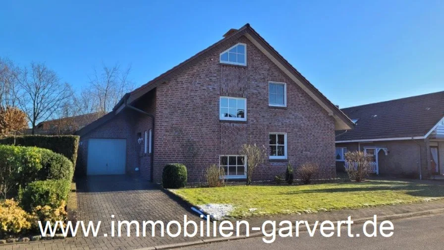 Ansicht - Haus kaufen in Borken-Weseke - Familiendomizil! Schönes Einfamilienhaus mit Garten und Garage, zentrumsnah in Borken-Weseke