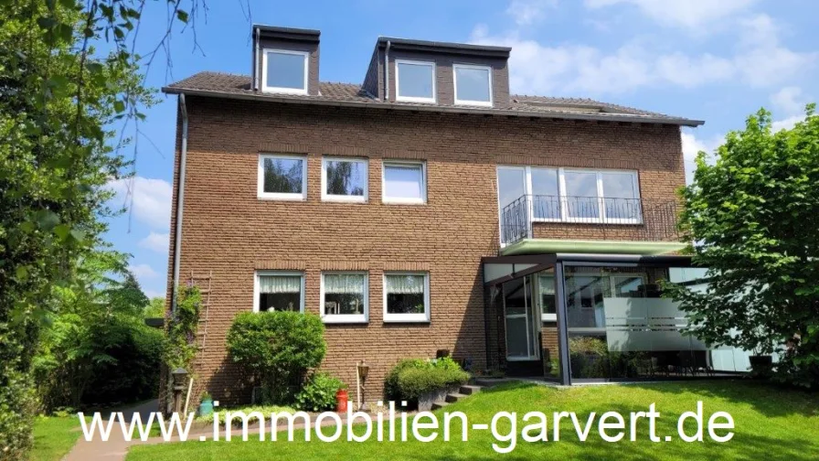 Ansicht - Haus kaufen in Dorsten-Rhade - Dreifamilienhaus! Großer Garten und Wintergarten, Balkon, Loggia, Stellplätze, am Ortsrand in Rhade